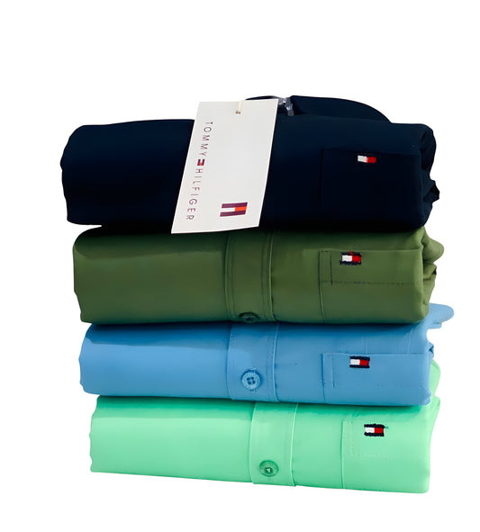 Men's shirts in navy, green, blue, and mint with Tommy Hilfiger logo.