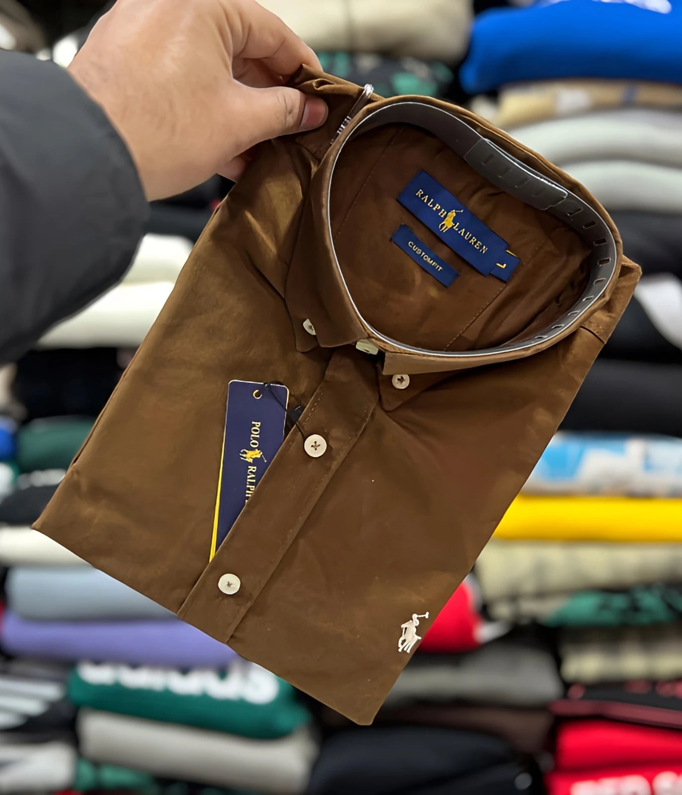 Brown Polo Ralph Lauren men’s button-down shirt, folded cotton shirt with embroidered logo, classic casual wear