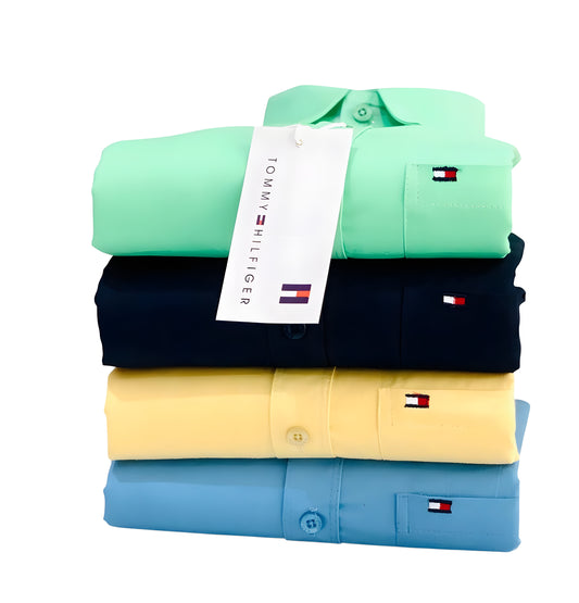  Tommy Hilfiger Men's shirts in green, navy, yellow, and blue with a visible tag.