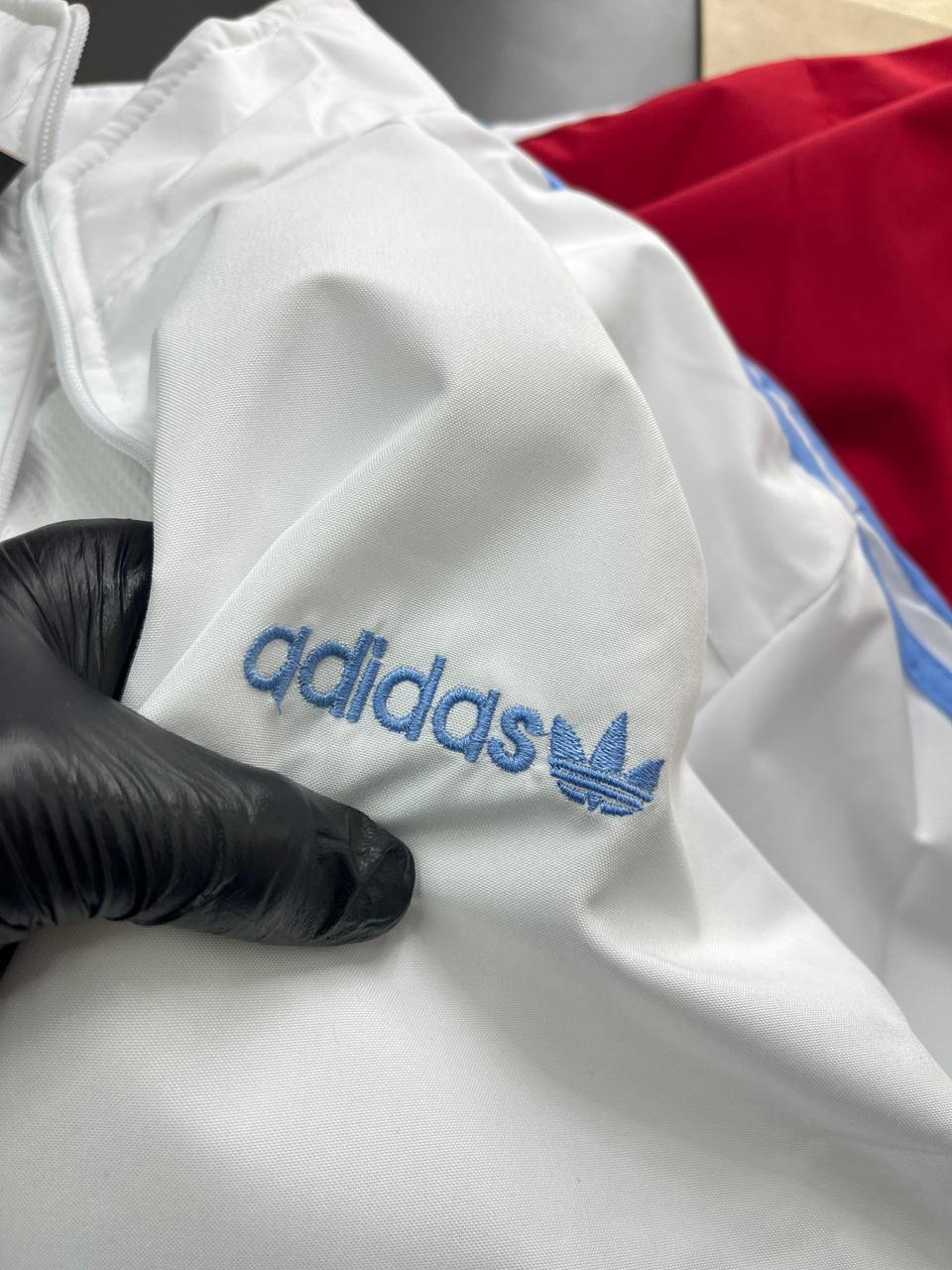 Retro White Track Jacket with Blue Stripes – Adidas-Inspired Athletic Windbreaker | Vintage Sportswear Style