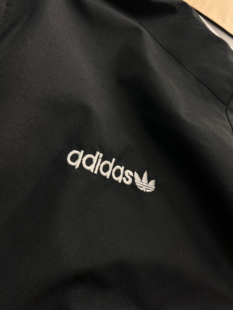 Retro Black Track Jacket with White Stripes – Adidas-Inspired Athletic Windbreaker | Vintage Sportswear Style